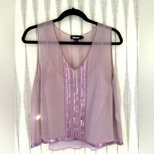 DKNY sheer beaded sleeveless top. Size 10 but fits medium size 8.